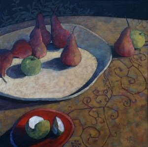 red pears on white platter