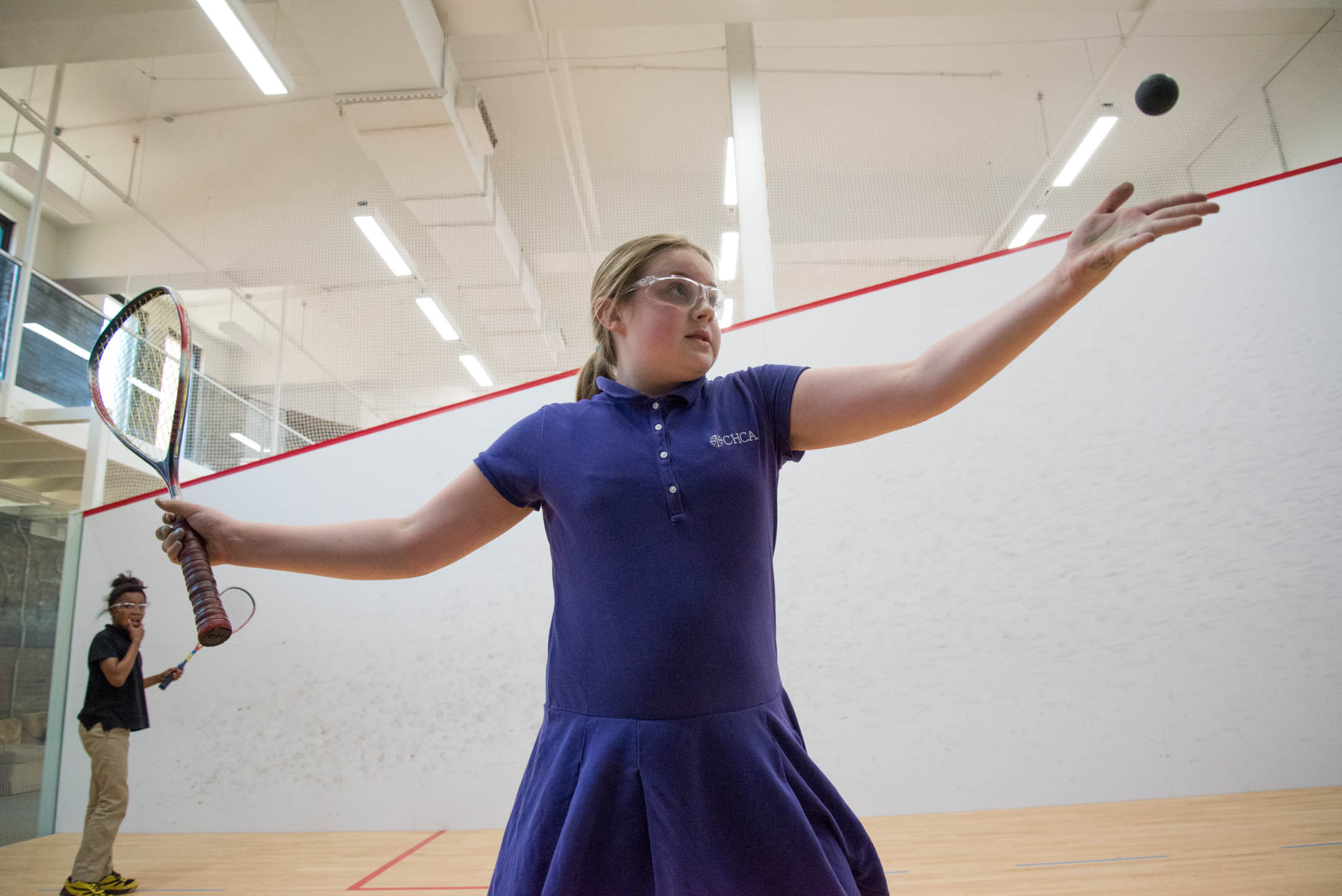 Payton Combs serves the ball in her match with Kiylah Smoot Monday May 8, 2017 at the Cincinnati Squash Academy.