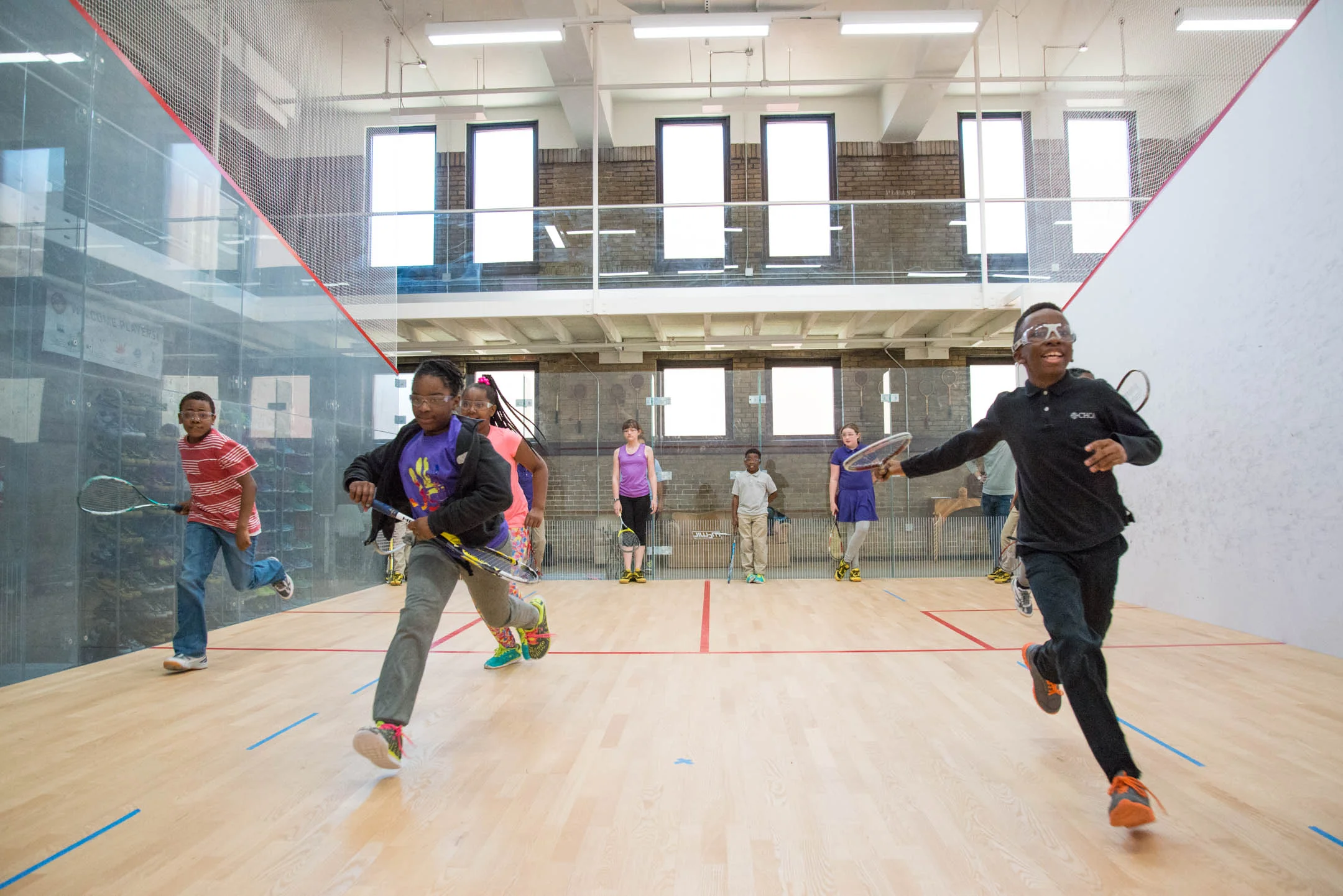 Kids of the Cincinnati Squash Academy run sprints during practice Monday May 8, 2017.