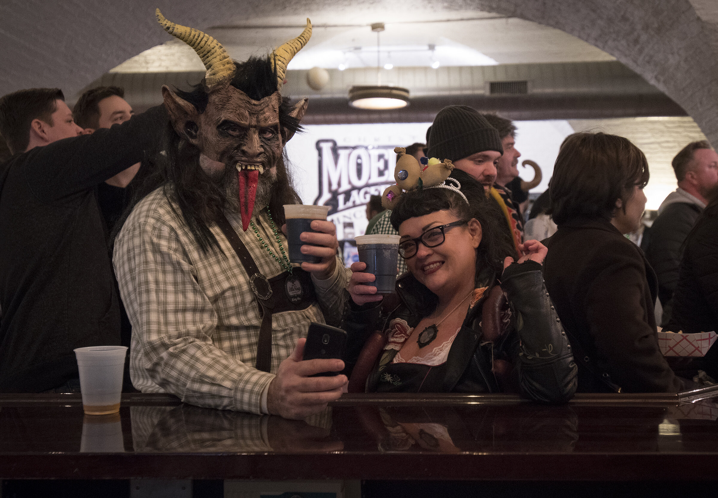  Hundreds pack into Christian Moerlein brewing after the annual Bockfest parade Friday, March 1, 2019 in Cincinnati, Ohio. 