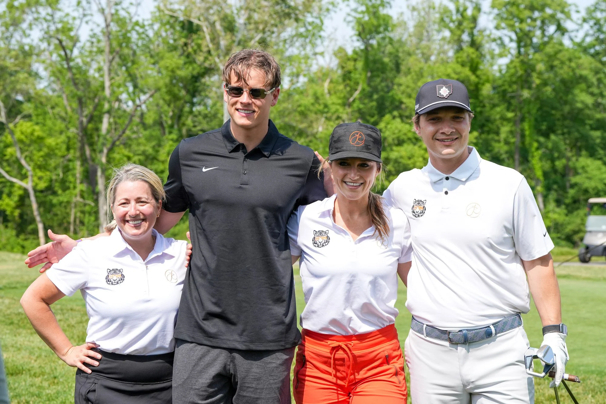  Darcie Bristow, Joe Burrow, Britney Ruby Miller and Dillon Ruby pose for a photo during the Inaugural Joe Burrow Foundation Golf Invitational Monday, June 5, 2023 at Cold Stream Country Cub. Jeff Ruby Culinary Entertainment is a presenting sponsor o
