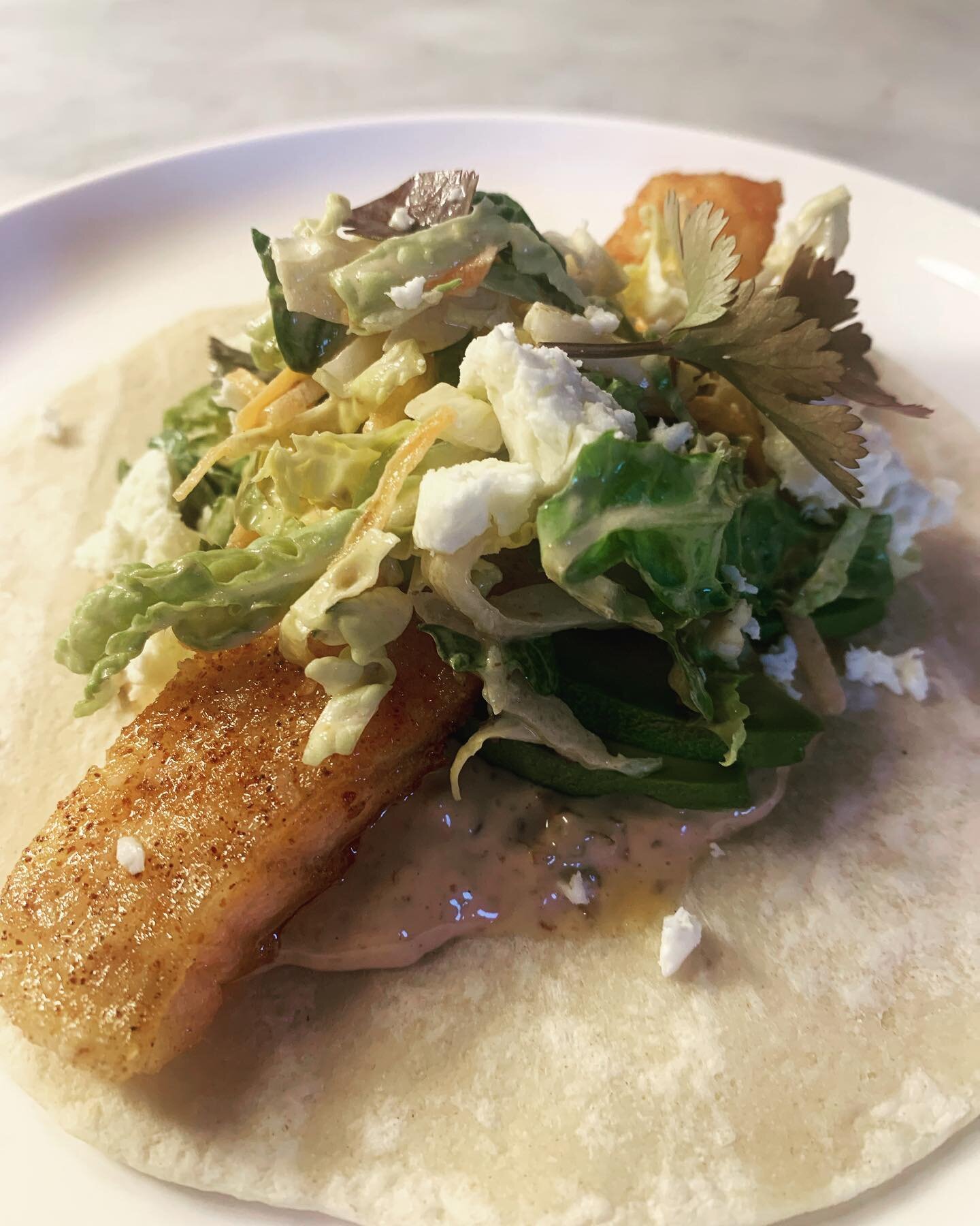 Salmon belly tacos- with chipotle heavy Napa slaw, lime juice, avocados, cilantro, and queso blanco. 

And yes until I can find @tortilleriasanroman quality corn tortillas out here in the #phillyburbs I&rsquo;m a flour shell kinda girl so don&rsquo;t