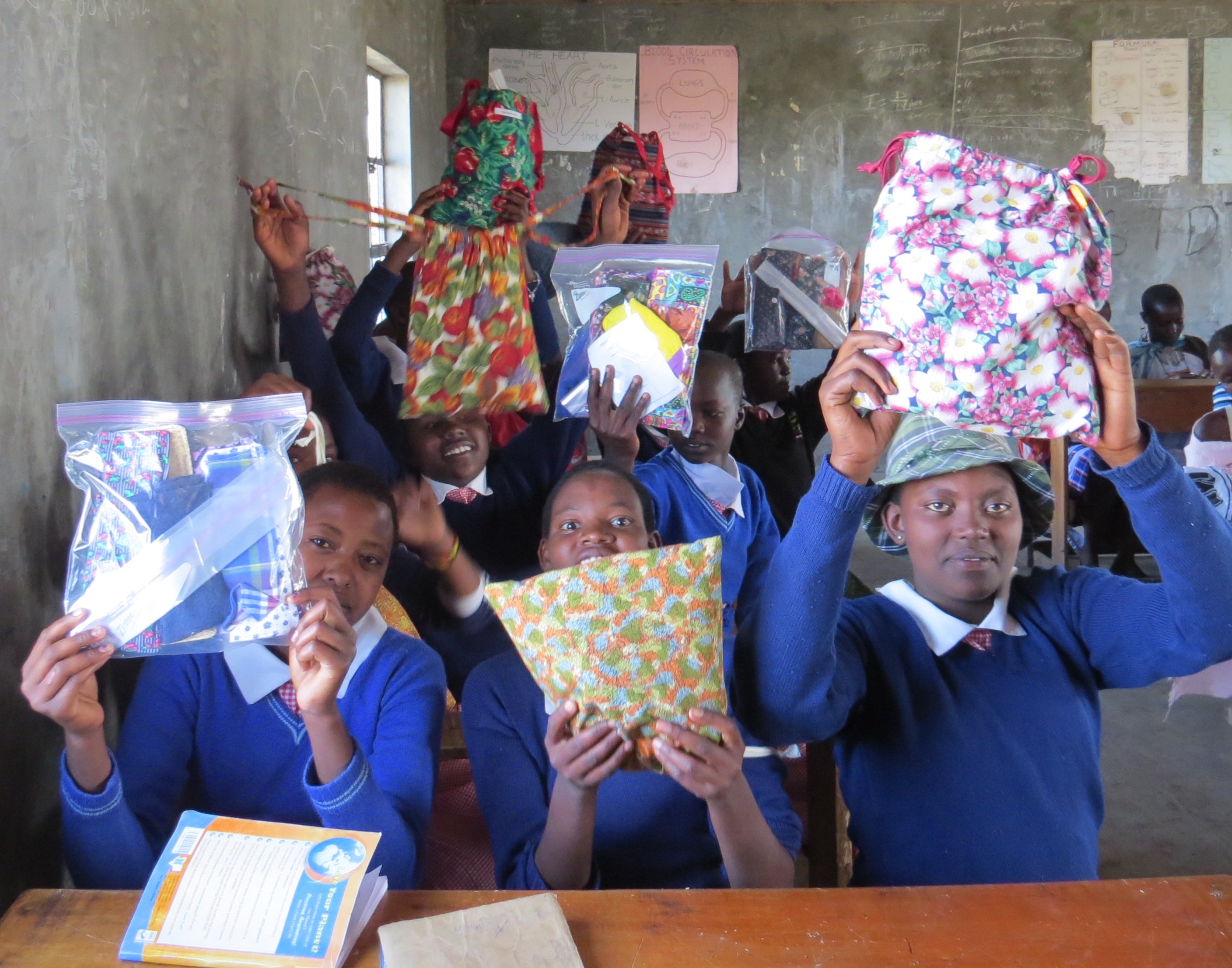 Students with hygiene kits from Days for Girls