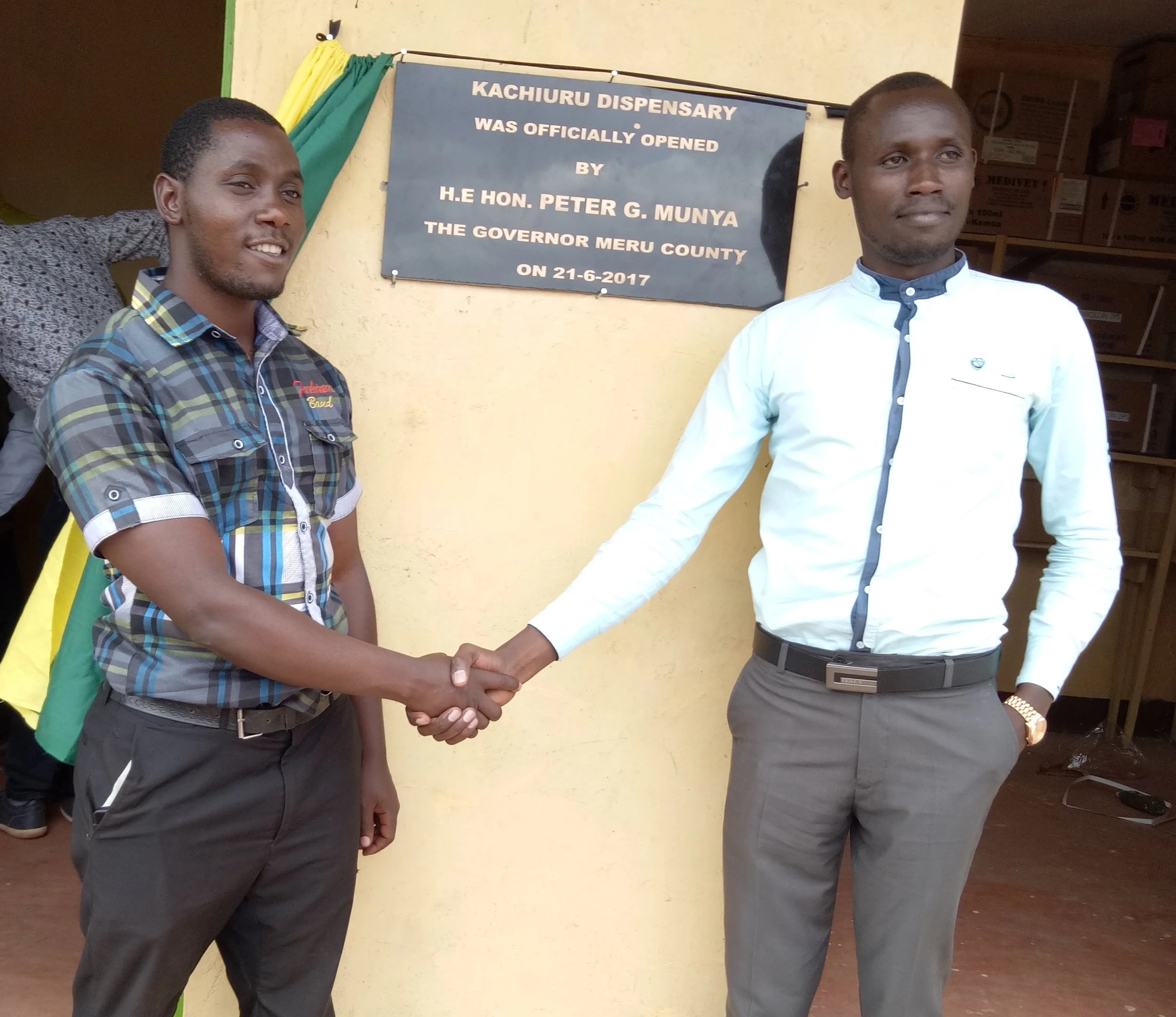 The Nurse and the Clinical Officer after the ribbon cutting