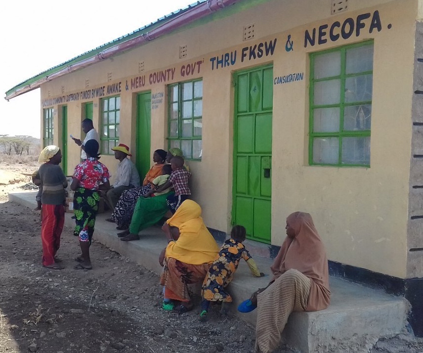 The first patients waiting for admittance to the Dispensary