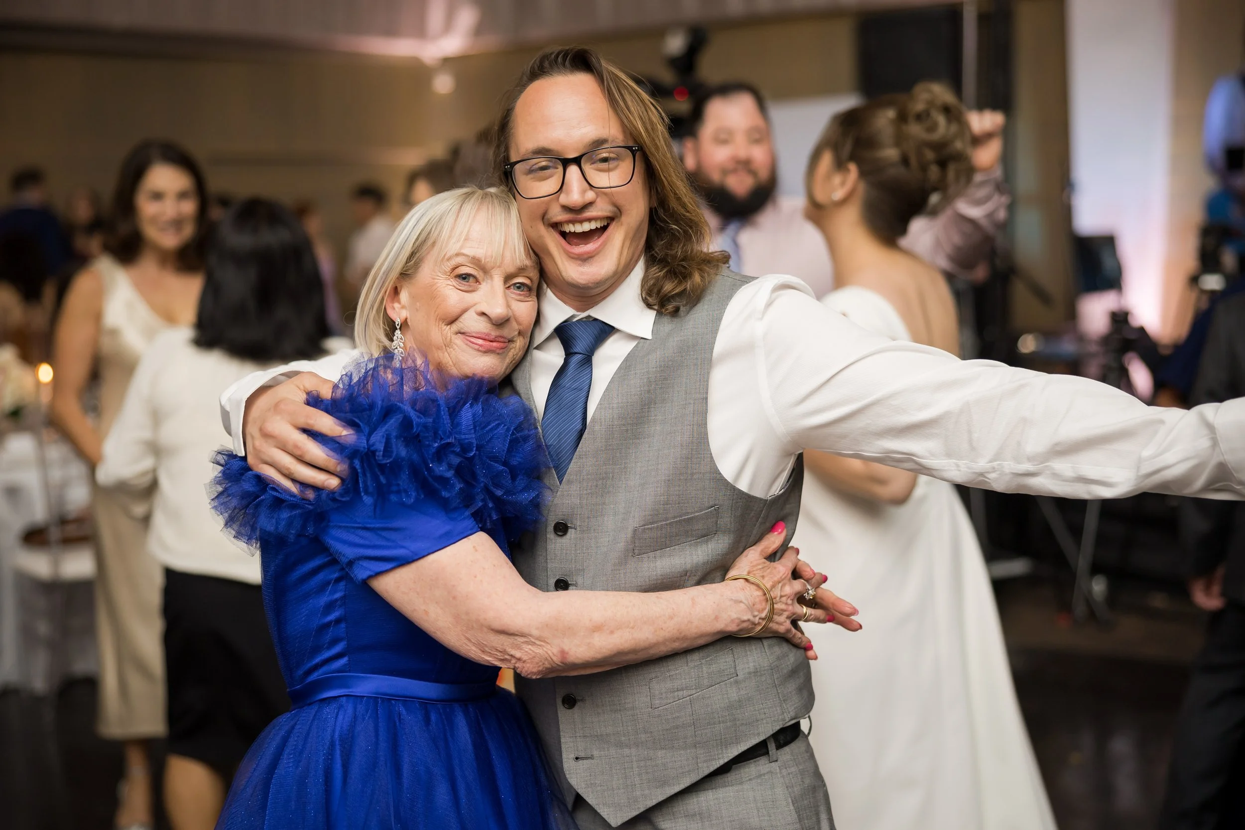 Guests smiling and having a good time during reception