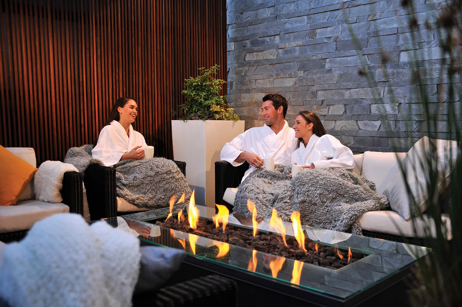 Friends in robes at spa.