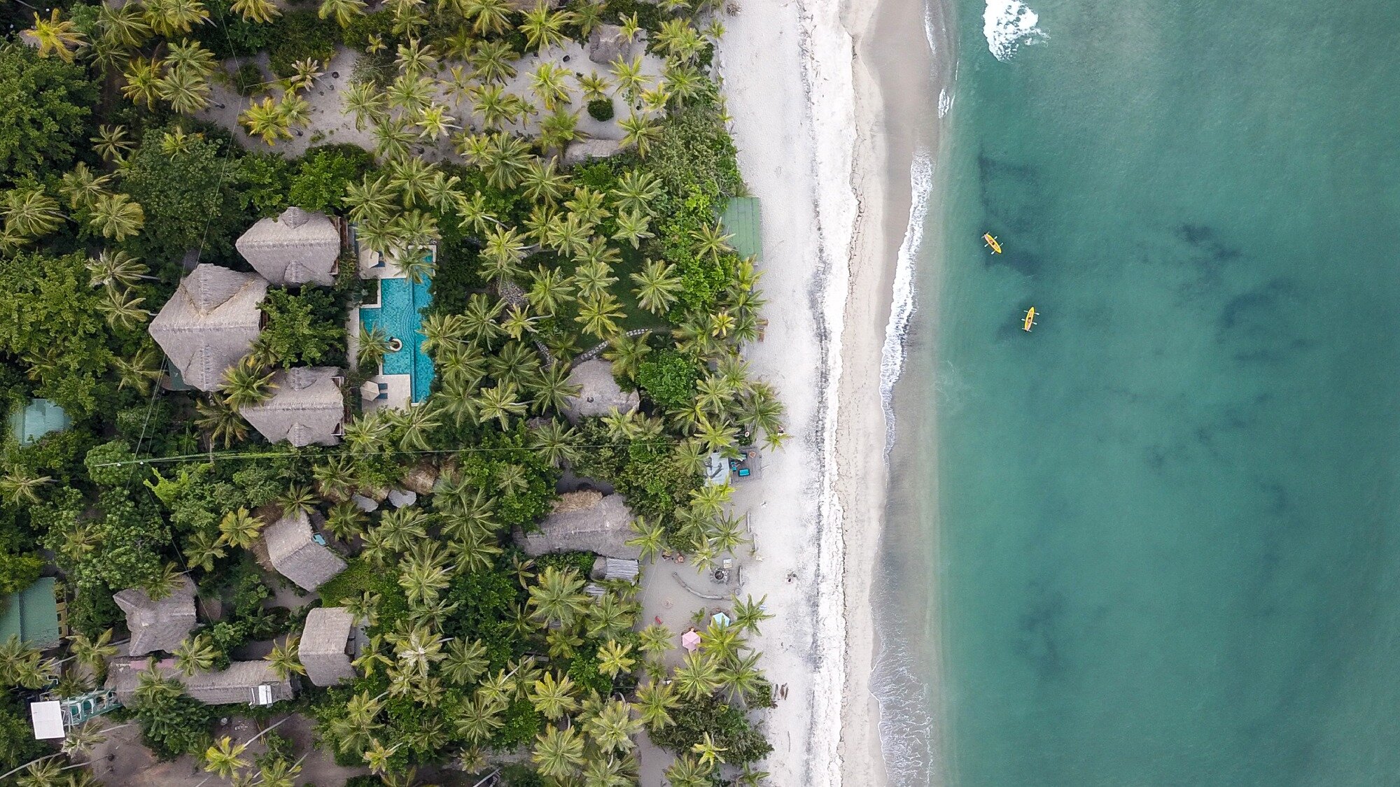 Drone view of Cayena Beach Villa Beach Resort near Tayrona Park.jpg