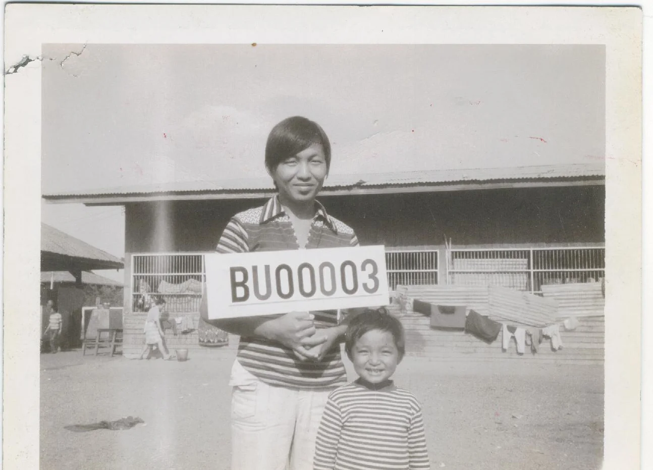 Bunseng with his nephew in Buriram Refugee Camp (1980).