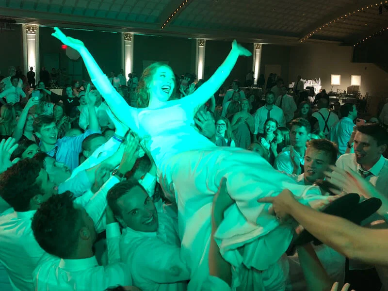 Exciting wedding reception with guests celebrating