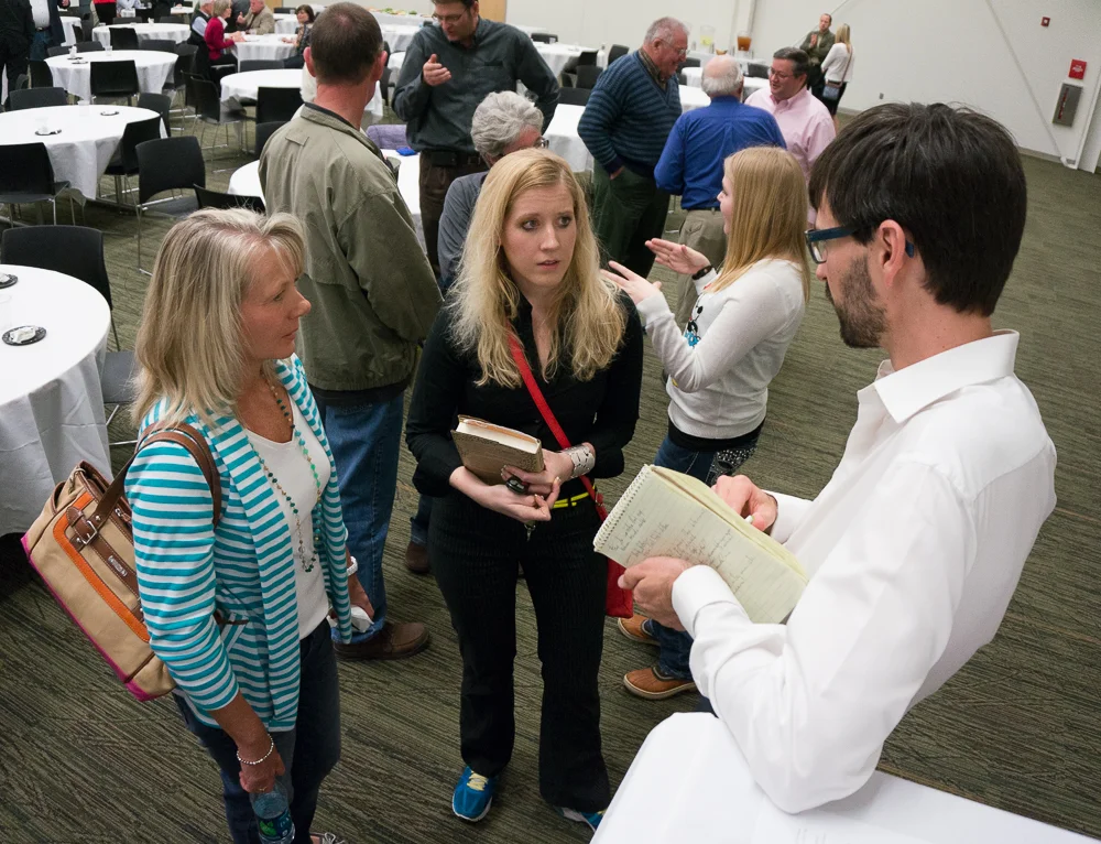 Event attendees visit with Nathanael Johnson about his reporting on GMOs.