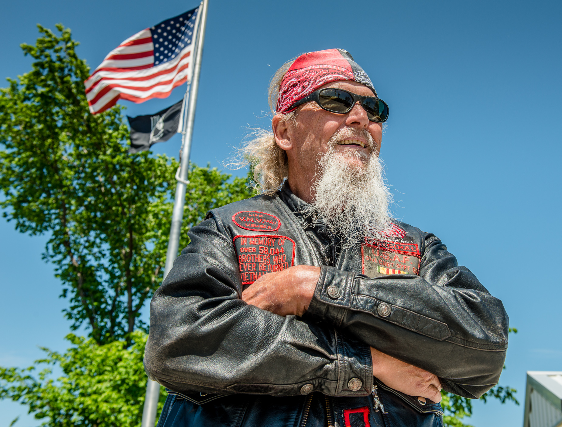 John Porter talks to a visitor at the Freedom Rock near Greenfield.