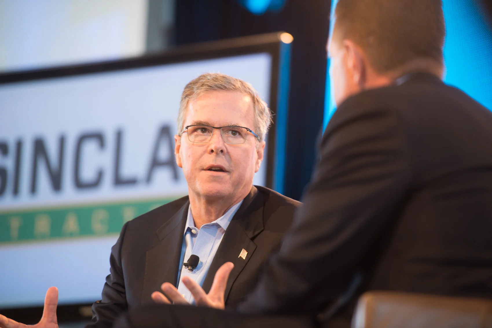 Former Florida Governor Jeb Bush talks with Bruce Rastetter during the 2015 Iowa Ag Summit. (Photo Joseph L. Murphy)