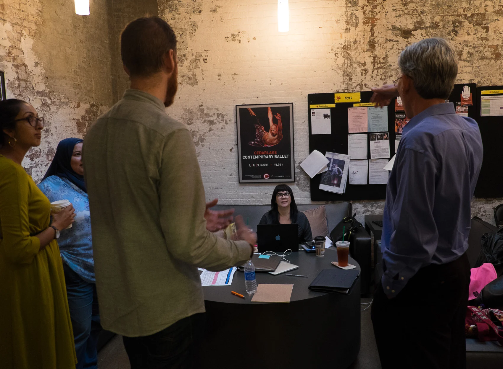TED representatives talk with speakers during a rehearsal for the event. (Photo: Joseph L. Murphy)