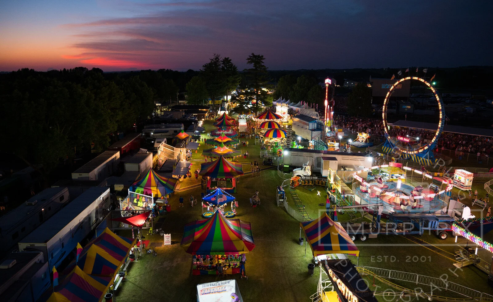  Dusk turns to night at the Great Jones County Fair in Monticello, Iowa. 