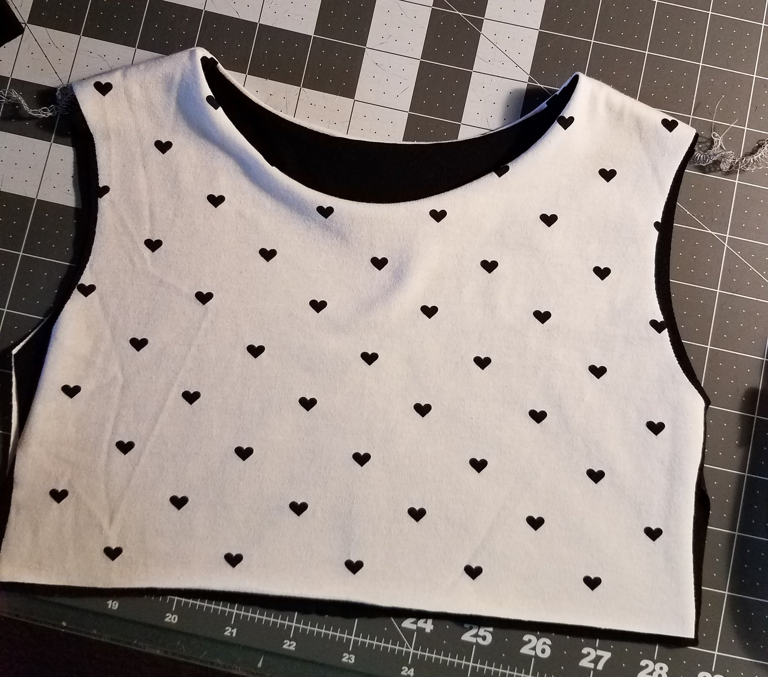 Main and lining bodices joined along the neckine