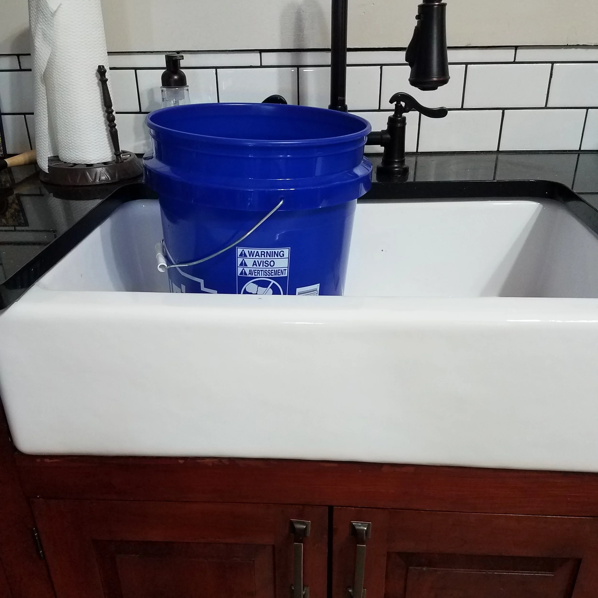 Just put a big ole bucket in my kitchen sink