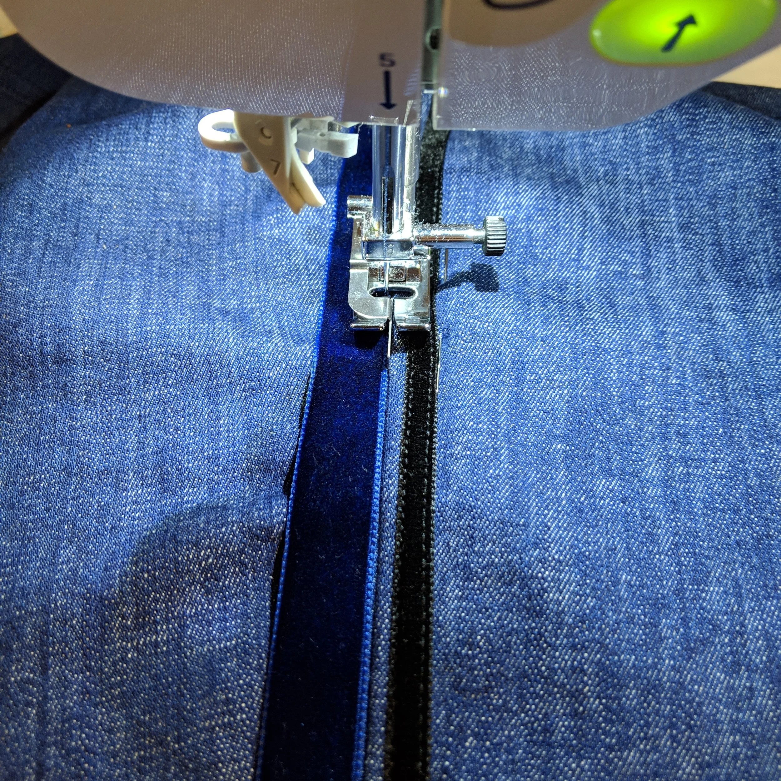 My edge stitch foot was my ally here.