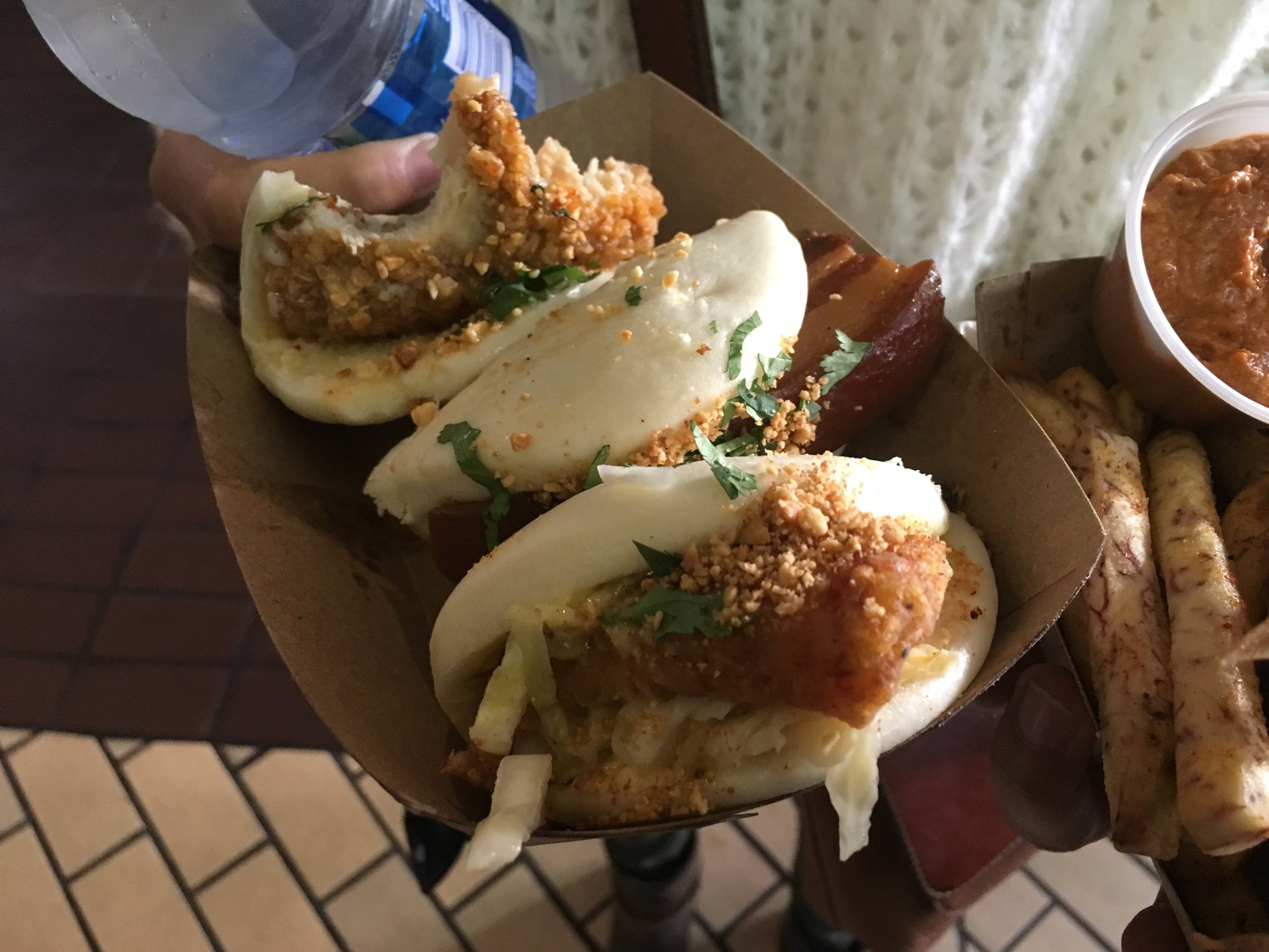 2 fried chicken and 1 pork belly bao
