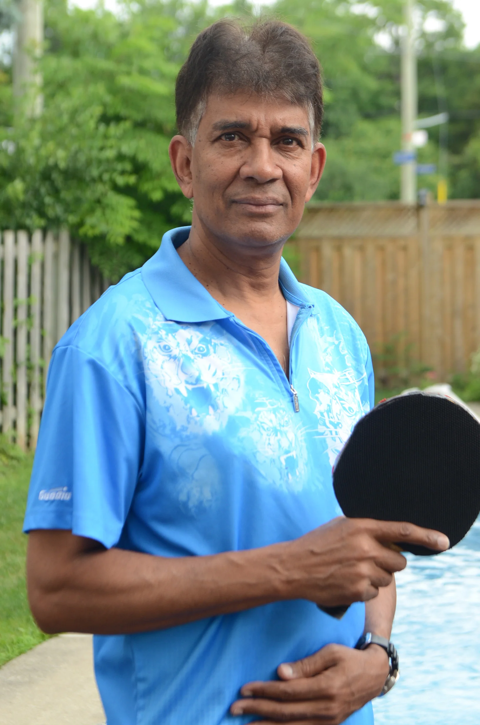 62-year-old wins T & T table tennis singles championship