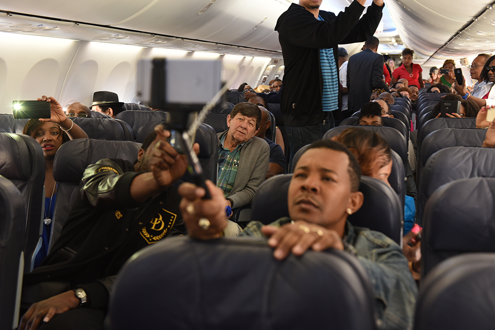Sunwing passengers recording the historic moment