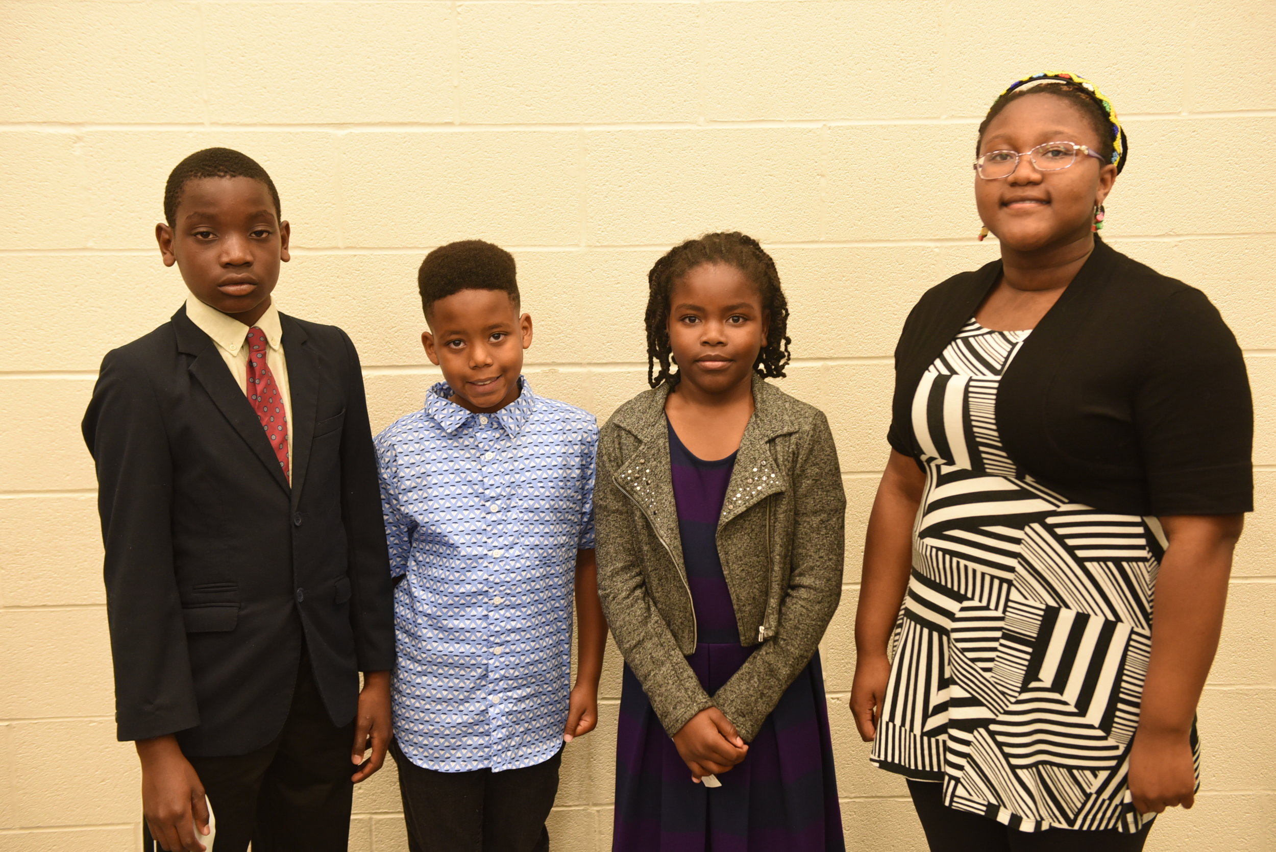 Elementary school awardees Idine Mbong (l), Gabrielle Williams, Josiah Walker & Olalou Oduwole