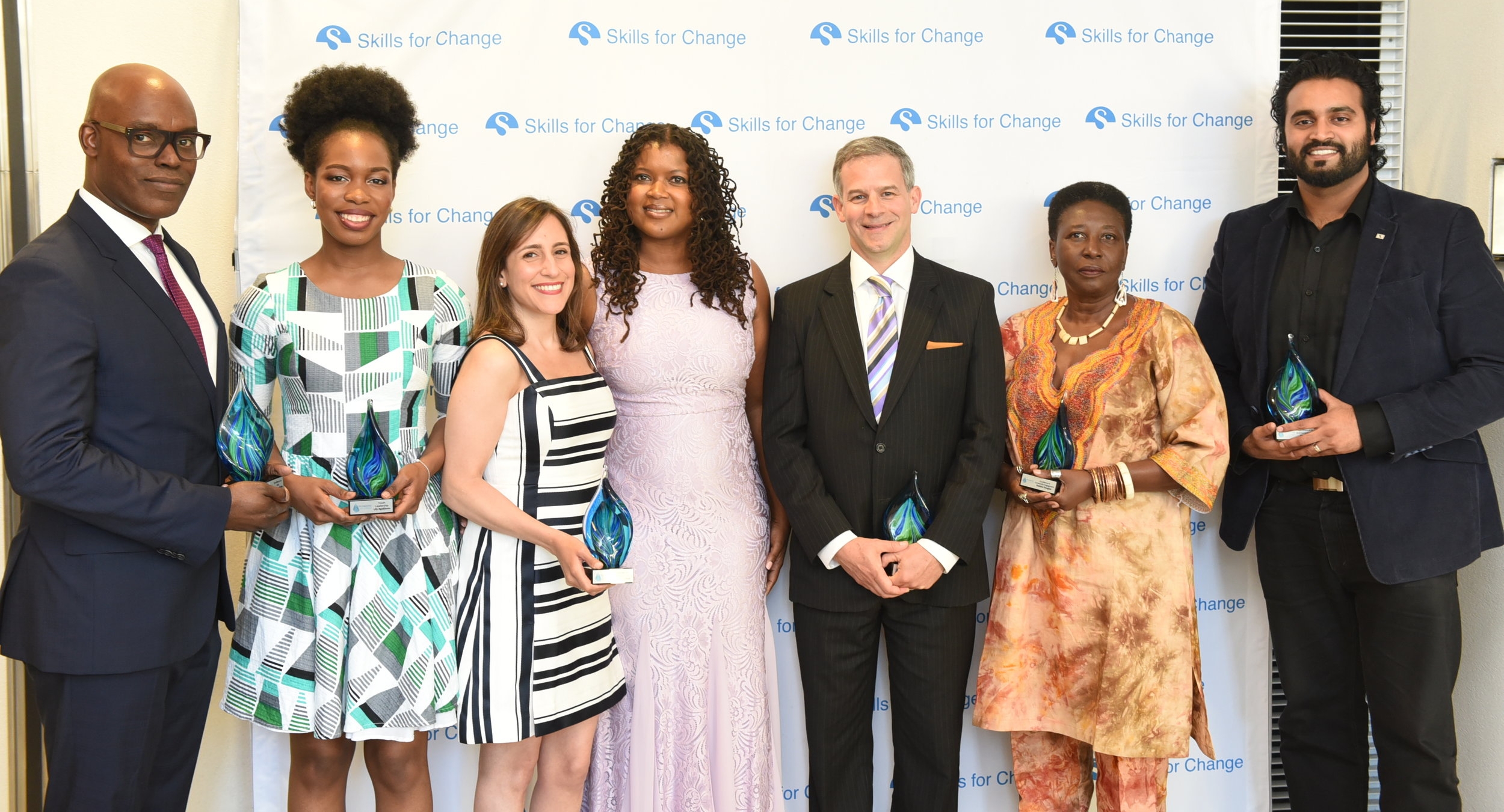 Skills for Change chief executive officer Surranna Sandy (c) flanked by Pioneers for Change winners Cameron Bailey (l), Lily Akagbosu, Leen Al Zaibak, Justice Alan Diner, Debbie Douglas & Shaji Nada