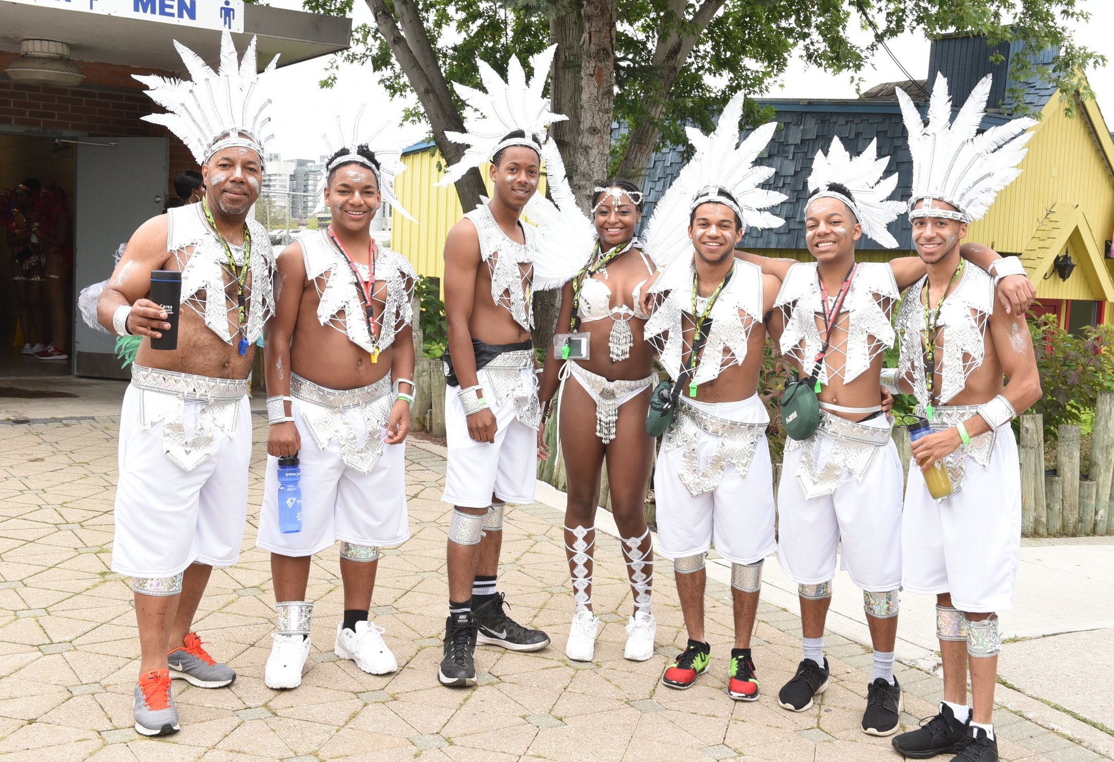 Family members Colin James (l), Quincy James, Roshad Wint, Terece Brown, Nelson Saddler, Kyle James and Devon Rogers played mas' with the winning Louis Saldenah Mas K-Club band