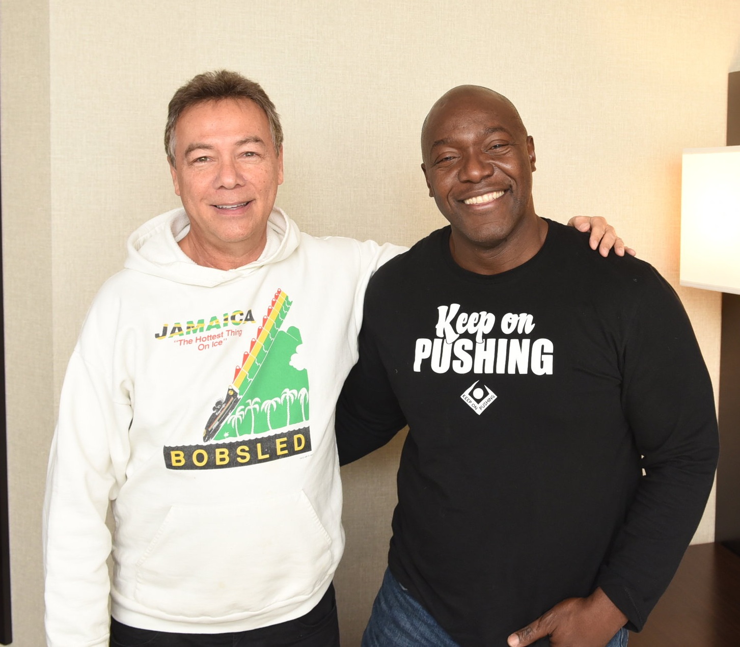 Devon Harris (r) with former Jamaica Bobsled Federation marketer Peter Christopher (PC) Harris