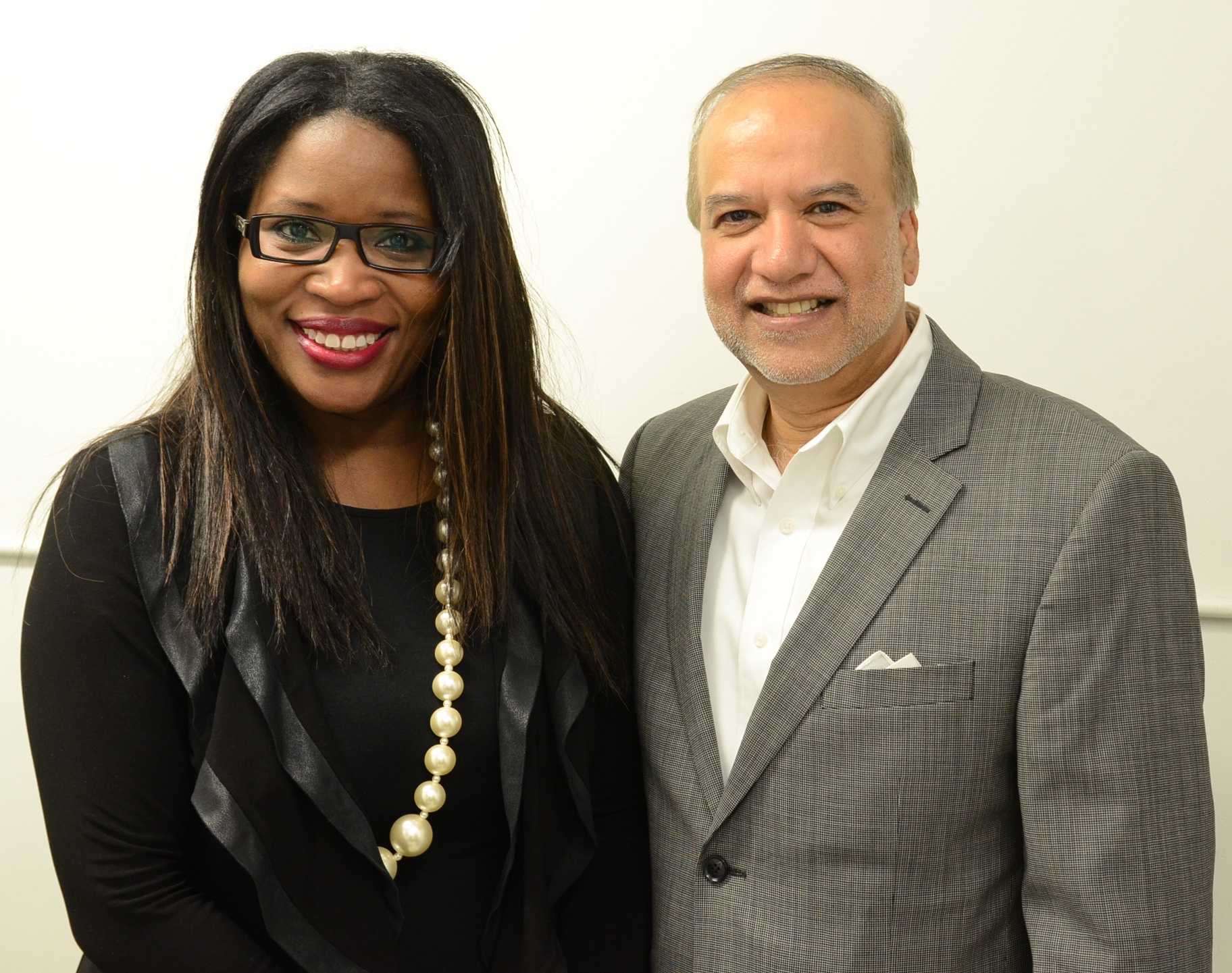 Claudette McGowan and Roger Mahabir, the chair and CEO of Tracker Networks Inc.