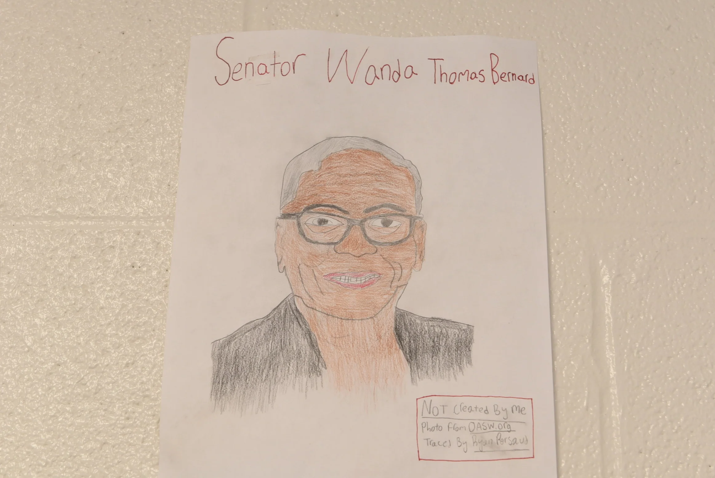 A sketch of Senator Wanda Thomas Bernard adorns the new school walls