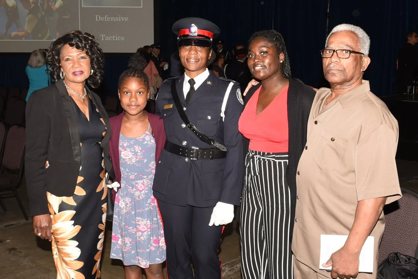Const. Nathalee Thompson with her parents Delroy Thompson & Eulalee Robinson and children Zakiyyah Williams & Zyanne Thompson