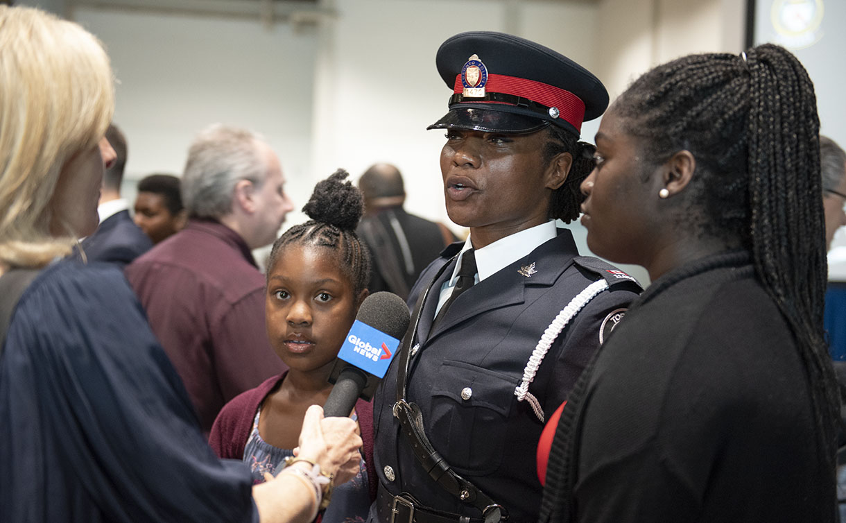 Const. Nathalee Thompson being interviewed after the graduation ceremony