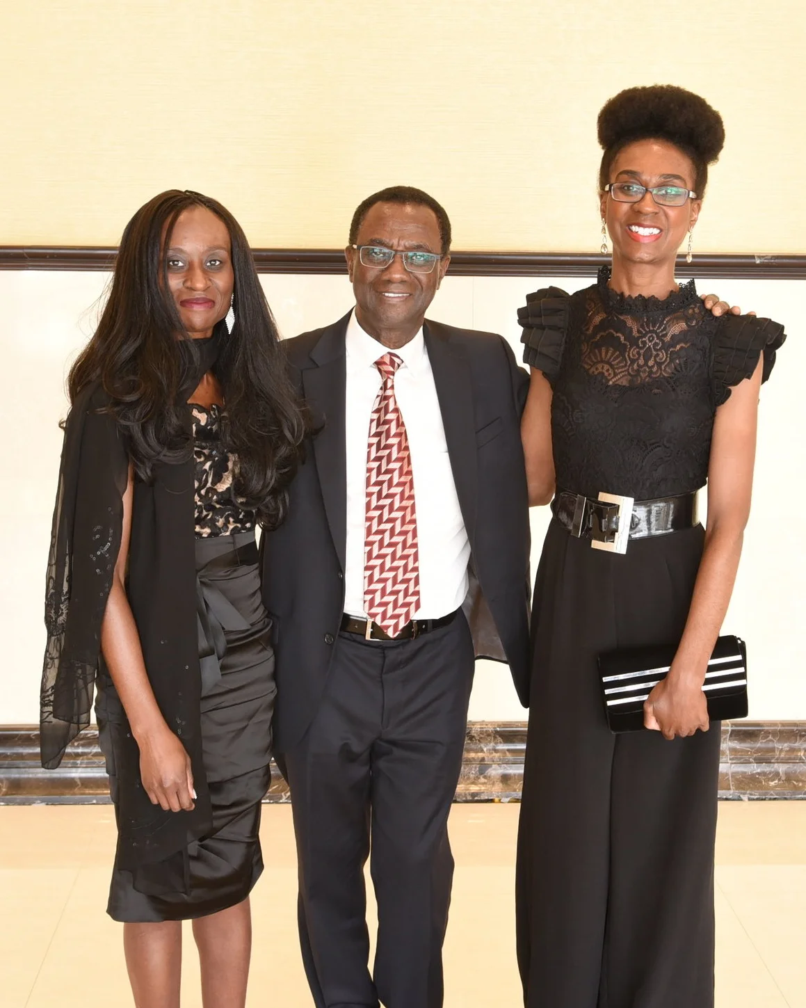 Dr. Mark Awuku and his daughters Linda (r) & Jocelyn