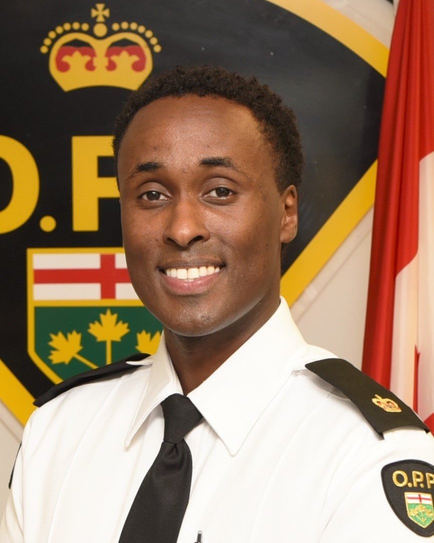 Astute leaders surround recently promoted OPP Inspector Ahmed Mohamed 