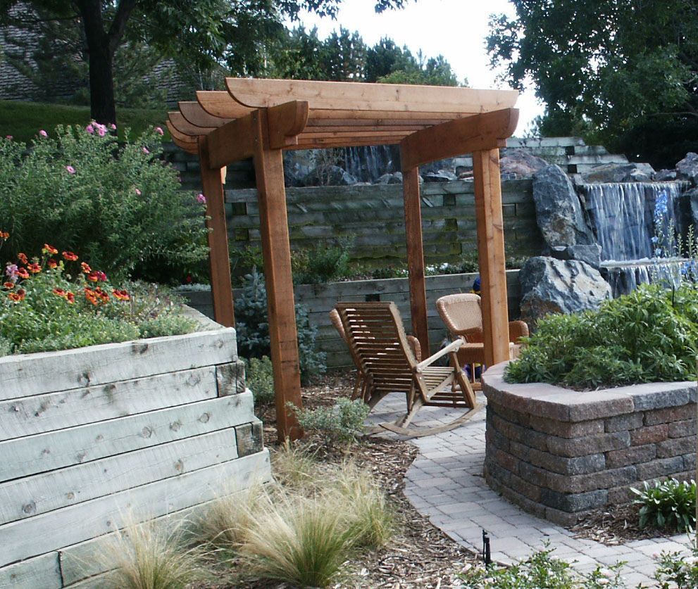 PATIO AND PERGOLA FOR ENJOYMENT OF WATER FEATURE