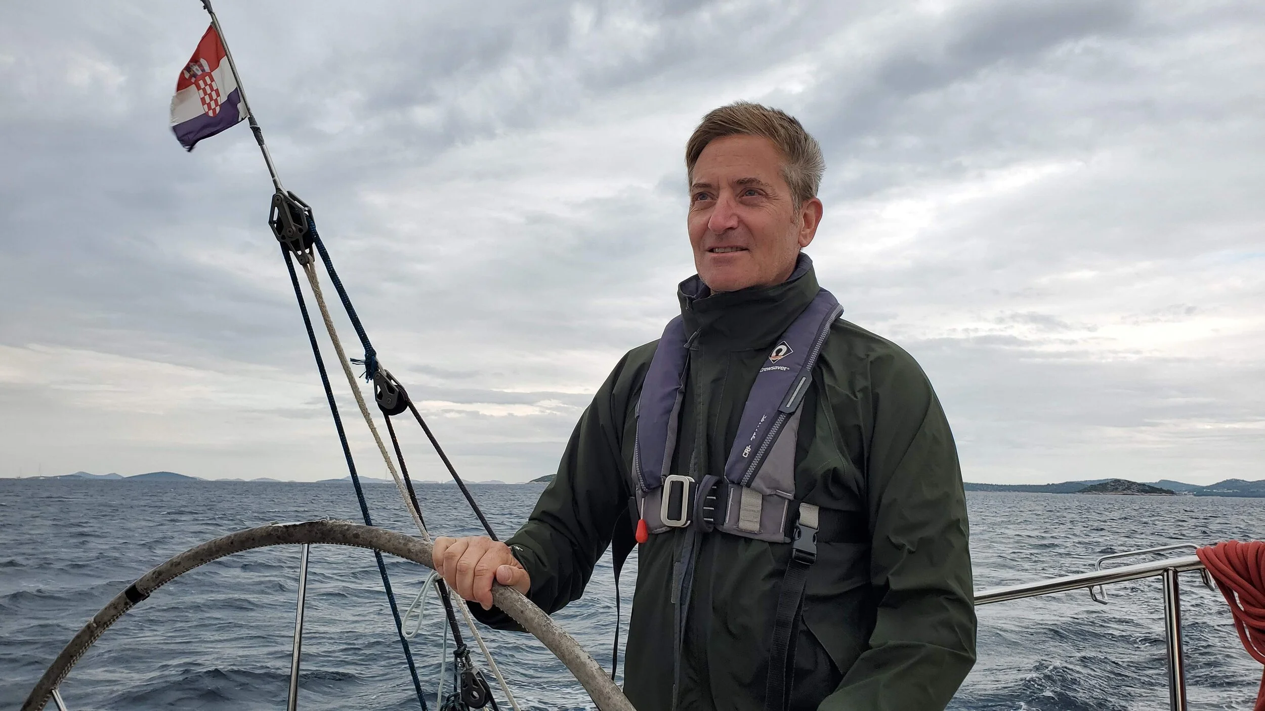 Laurent at the helm of our Beneteau 36 Nostromo