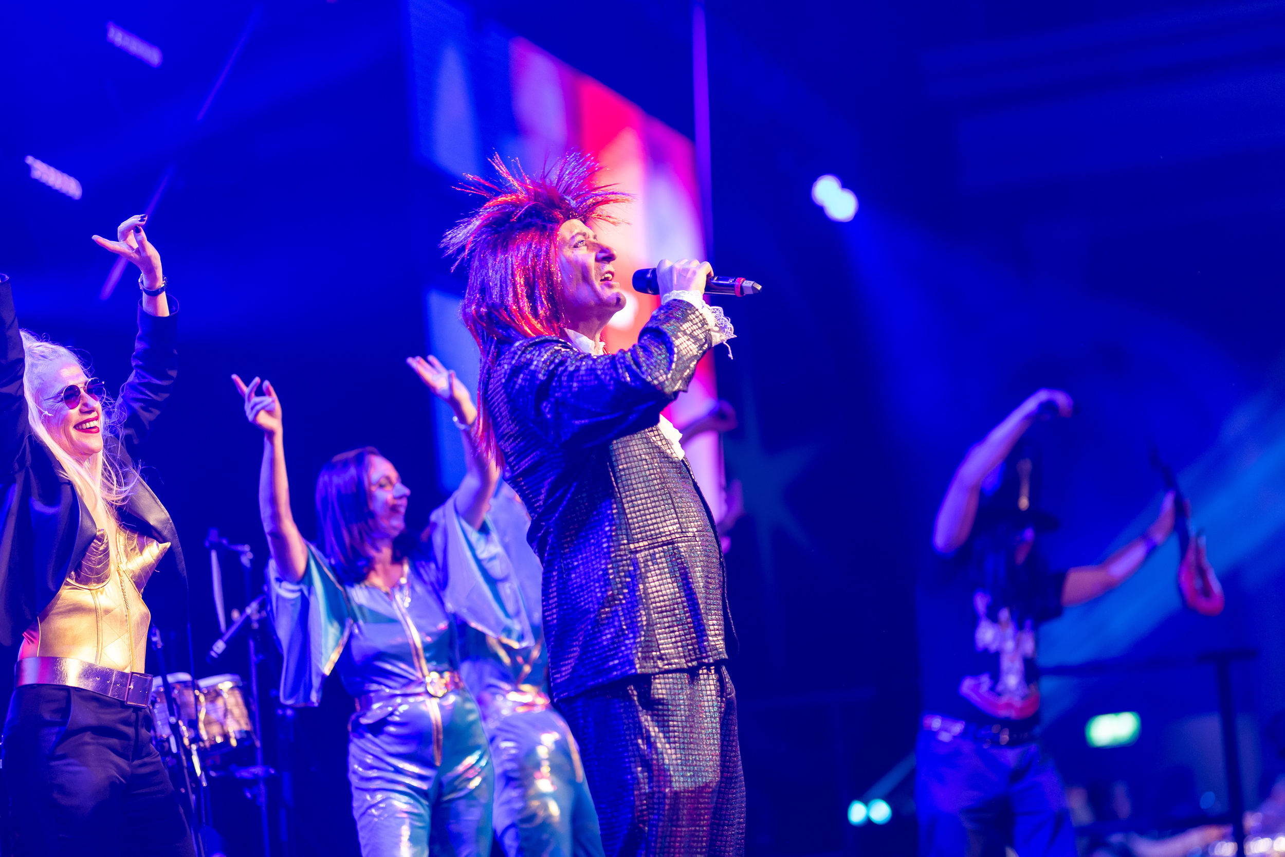 Laurent in action  singing Starman at Eurostar Christmas Party