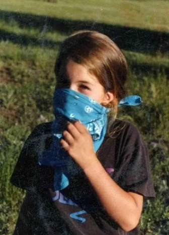 Lara at the sheep camp, around 1994