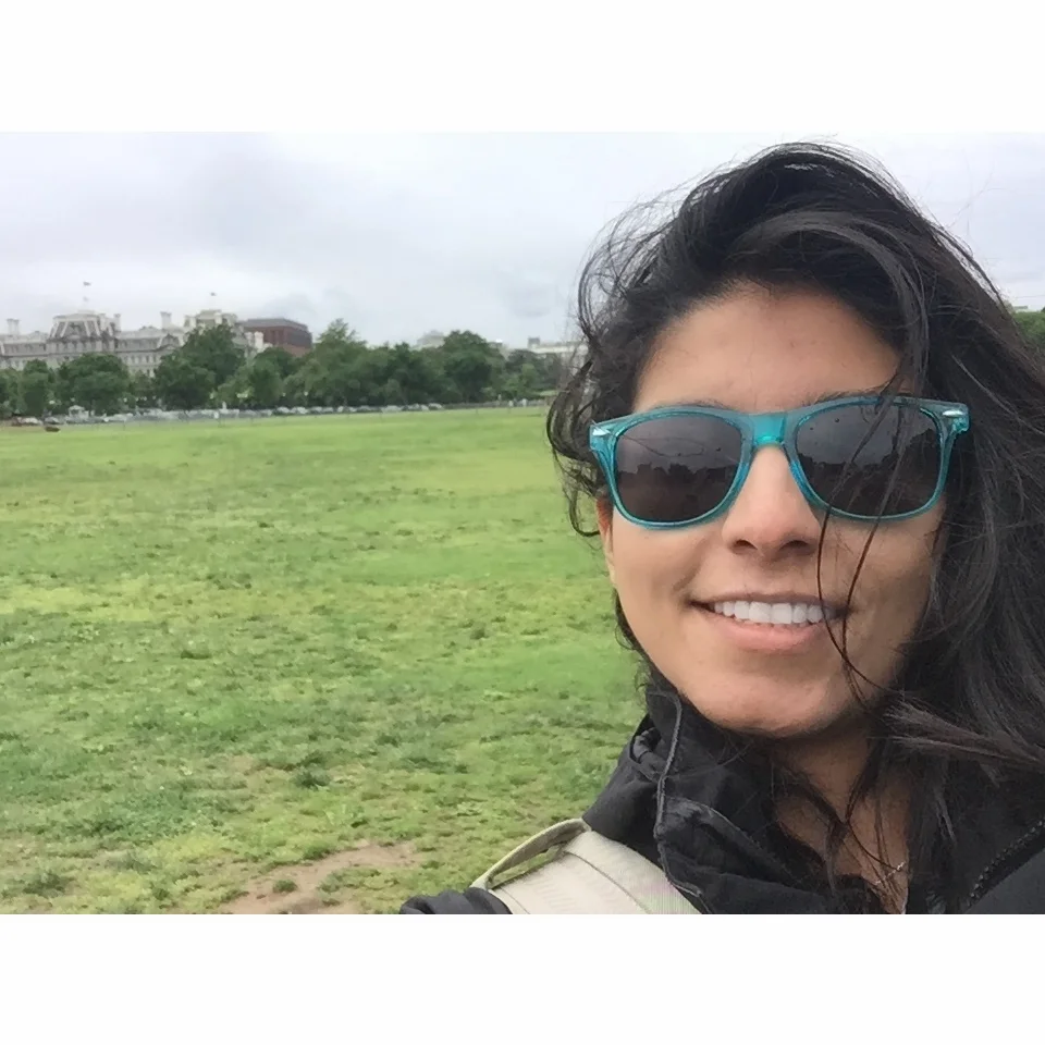 Here's a picture of my face completely obscuring Barack Obama's old house.
