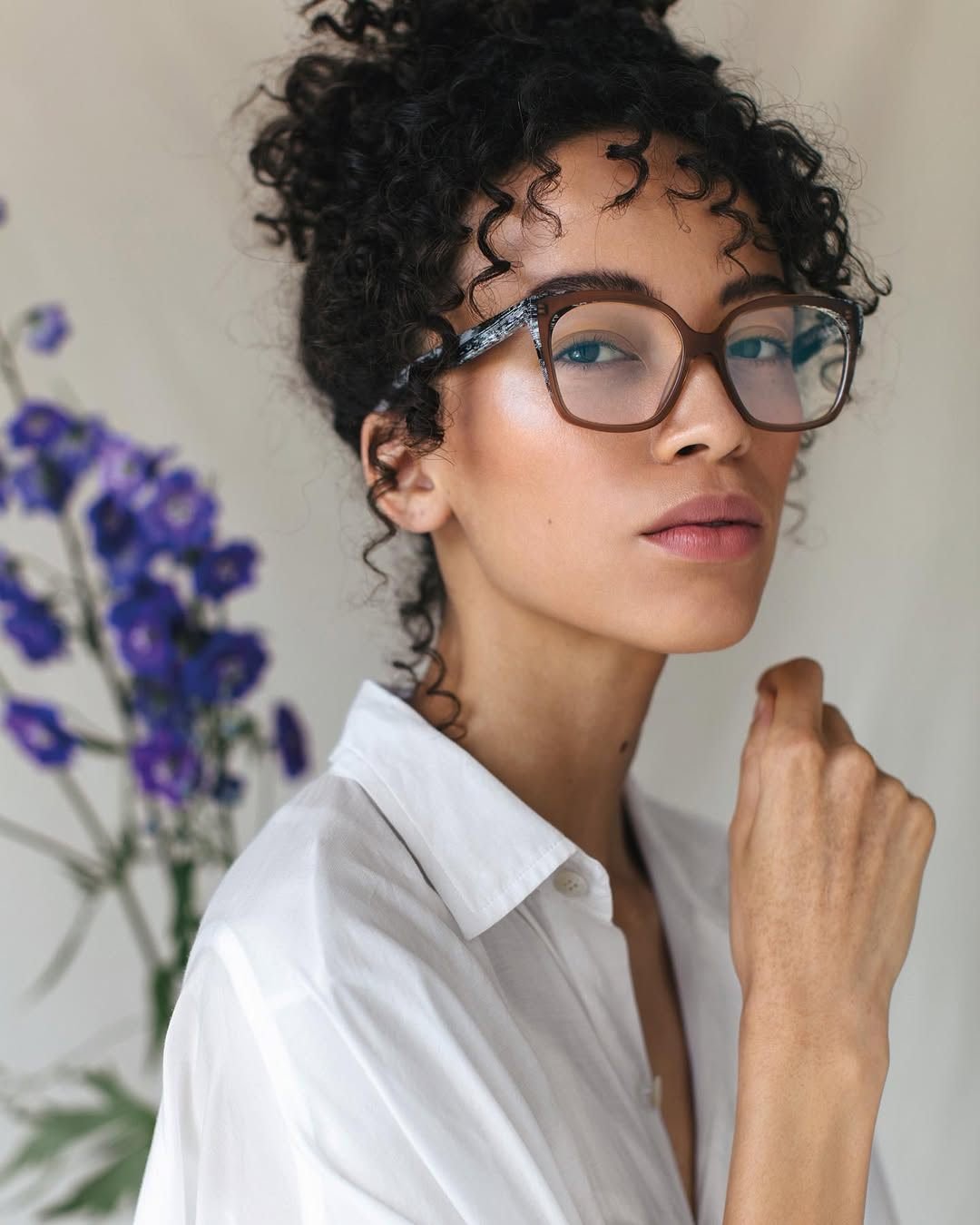 There's a term @yohjiyamamotoeyewear uses for the YY1037 that's worth unpacking: a frame within a frame.

It refers to the two-finish layering on this cat-eye &mdash; the marbled black and white pattern across the upper portion of the frame, and the 