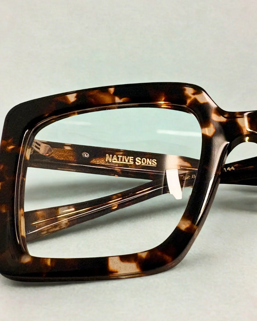 The frame most people want.
Then talk themselves out of.

"Too bold." "Too much." "Maybe not for me."
You've said at least one of these.

Bold frames don't overpower a face &mdash; they define it.
The right square shape 