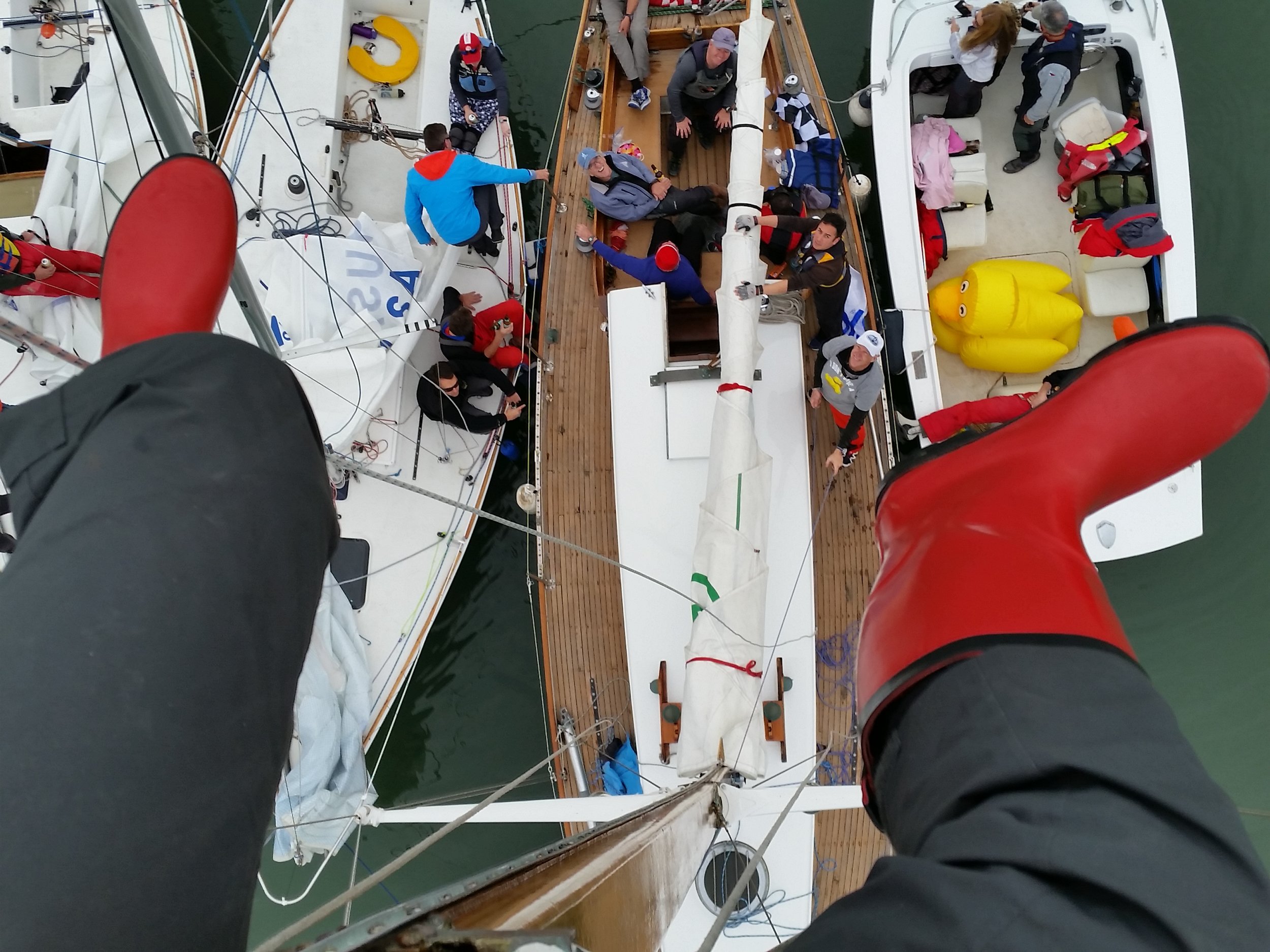 Every now and then things slow down long enough to scale a mast and grab new point of view. With silly red costume boots, up I go on the Clipper Farallon after he annual Crew You J/24 and small boats regatta.