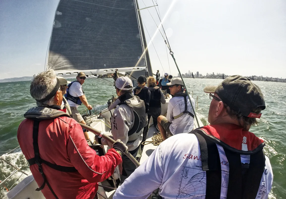 On the course early to check the tides aboard Santa Cruz 50 Deception day two of Rolex Big Boat Series. A crew count of eleven is fine for days where under 20-knots prevail. Ahead is Alcatraz Island and to the right is the San Francisco city front.