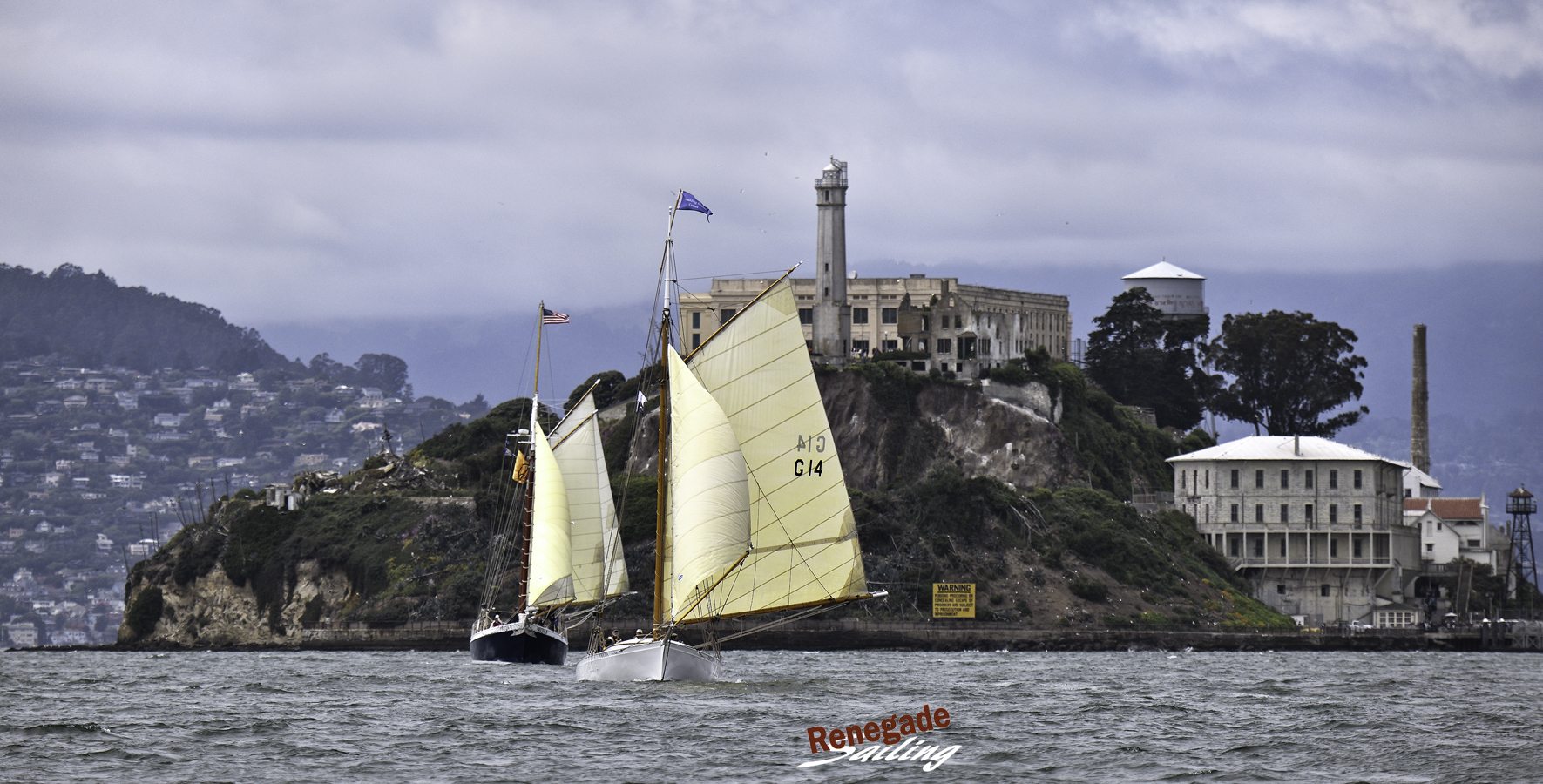We buzzed ahead of the fleet to watch 1885 gal Freda (white hull) and schooner Freda B make their way cross-bay. It's not San Francisco without fog, and when the sun does poke out and cast light onto sails, well, it's a darn pretty sight.