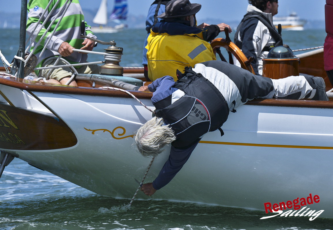 This has got to hurt…cutting the cord to free up the spinnaker on San Francisco Bay. This is schooner Mayan .