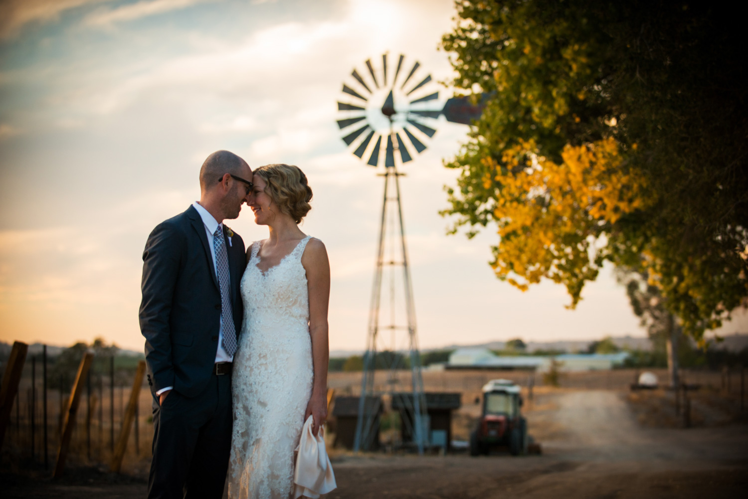 wedding_chateau_margene_bride_groom_windmill.jpg