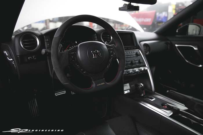 Wilson also started concentrating on interior details as well as the exterior of the vehicle. He opted for a few carbon pieces by CarbonTek, a Willall shift light and a MINE's steering wheel. 