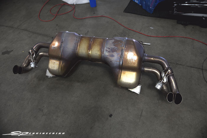 Thankfully with the invention of v-band clamps, the hefty factory exhaust system came off with a breeze. 