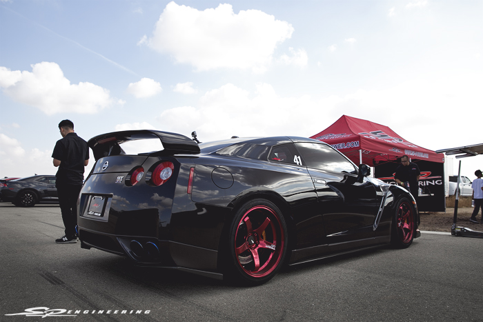 Louie's GT-R is a neck breaker. The candy apple red Advan GT's seriously stands out on this menacing machine.